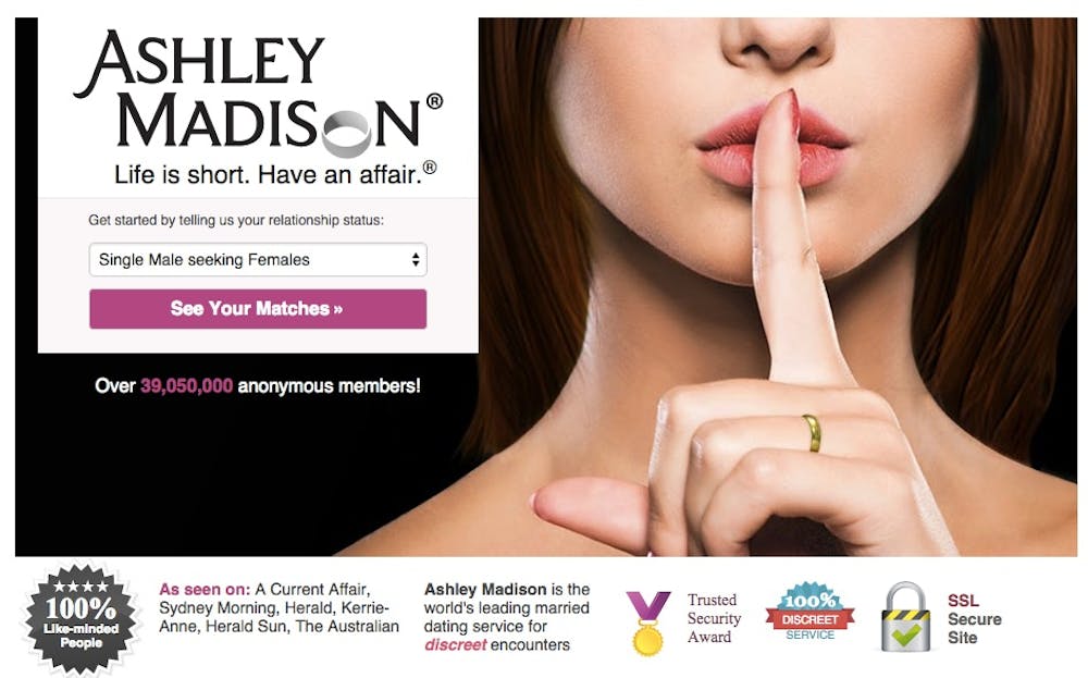 Ashley Madison homepage screenshot advertising the service alongside a 'Trusted Security Award', a '100% Discreet Service' badge, and an 'SSL Secure Site' badge.